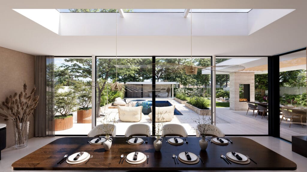 Grote houten eetkamertafel, driedelig daklicht, dubbele aluminium hefschuifpui met zicht op overkapping, doorkijkhaard en poolhouse.